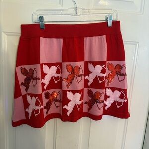 Red and Pink Queen of Sparkles Cherub Patterned Skirt.